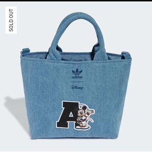 Adidas Disney Mickey MINI AIRLINER denim BAG
New with tag
